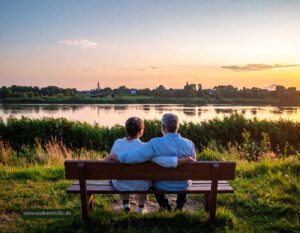 Rentnerpaar genießt den Sonnenuntergang wie damals in Algyö, Ungarn – ein neues Leben am Flussufer für Auswanderer über 50